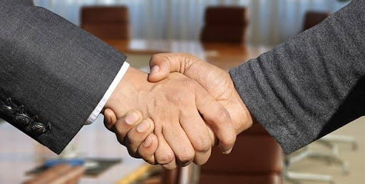 Two people shaking hands